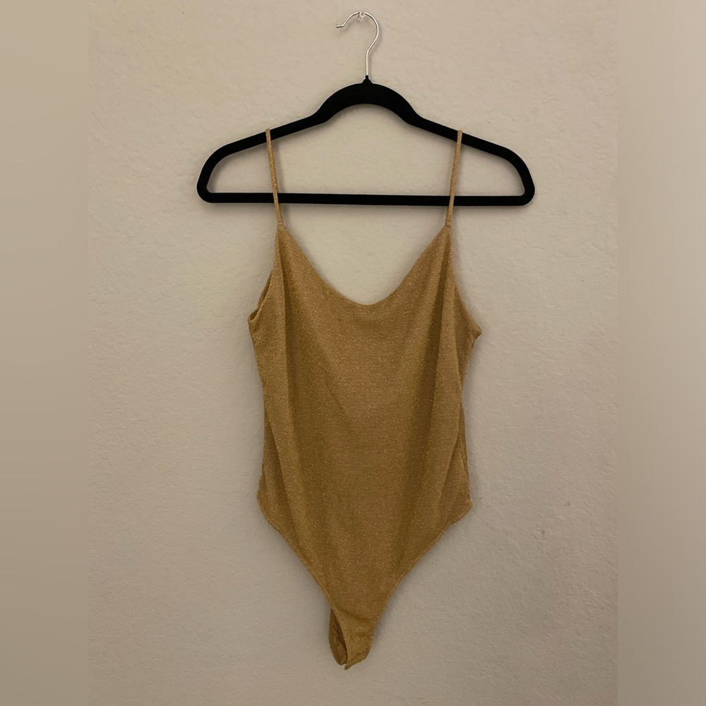 Body elegante brillante en dorado talla M